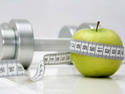 Beach Body Nutritional Counseling photo of apple with tape measure